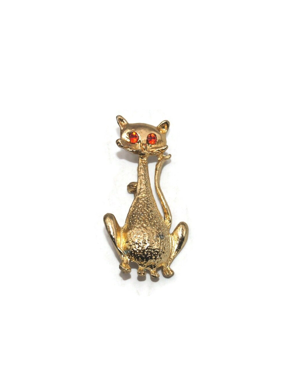 Vintage Gold Tone Cat Brooch with Orange Rhinestone Eyes.